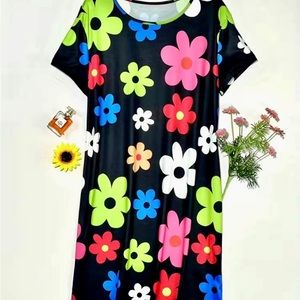 Super cute, casual, floral print dress. Size 14. Rounded neck and short sleeves.